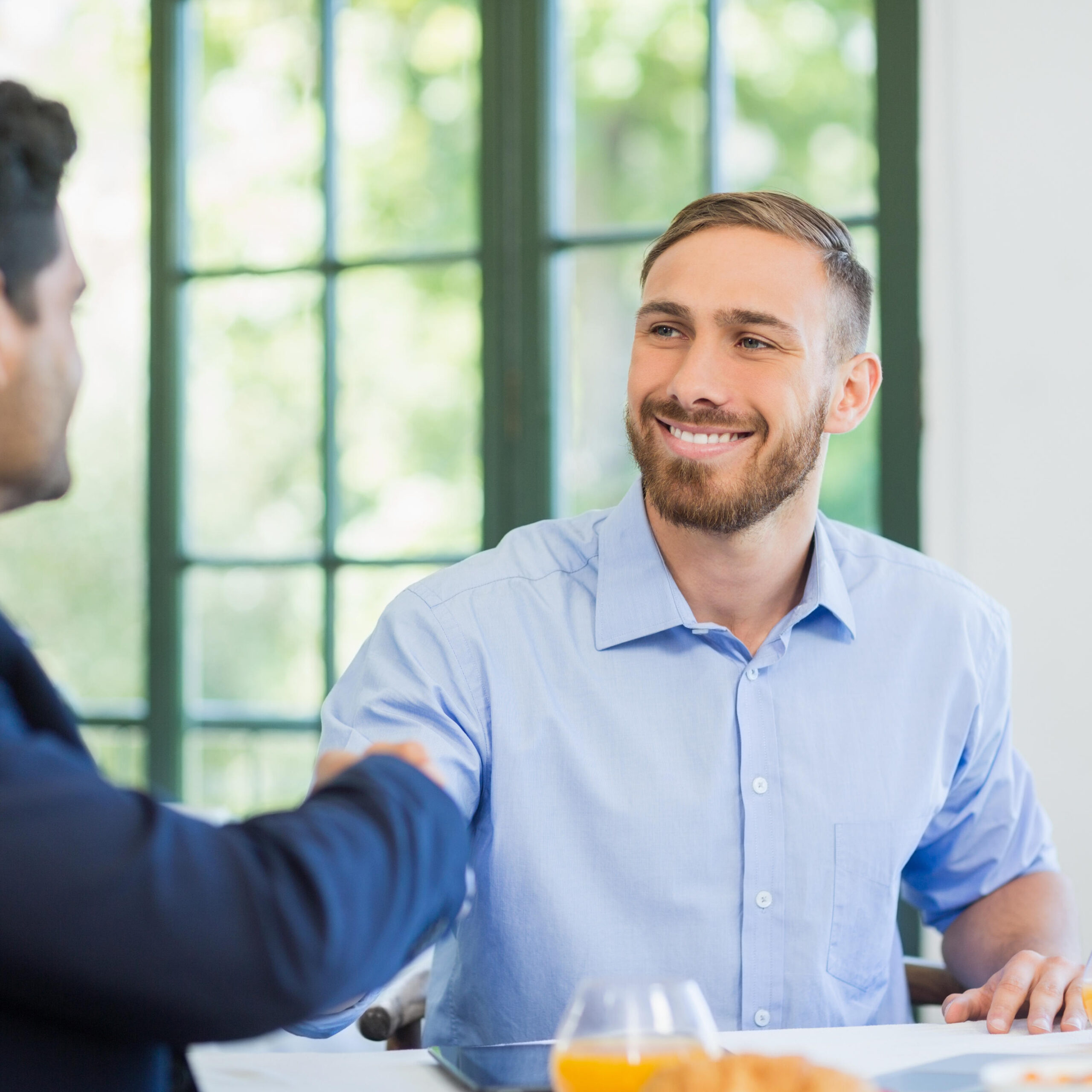 Businessmen shaking hands with each other